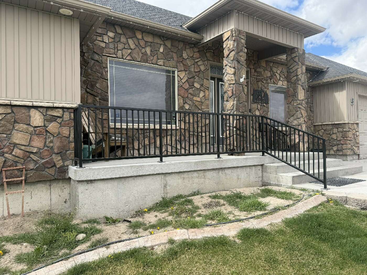 Exterior rail on stone home